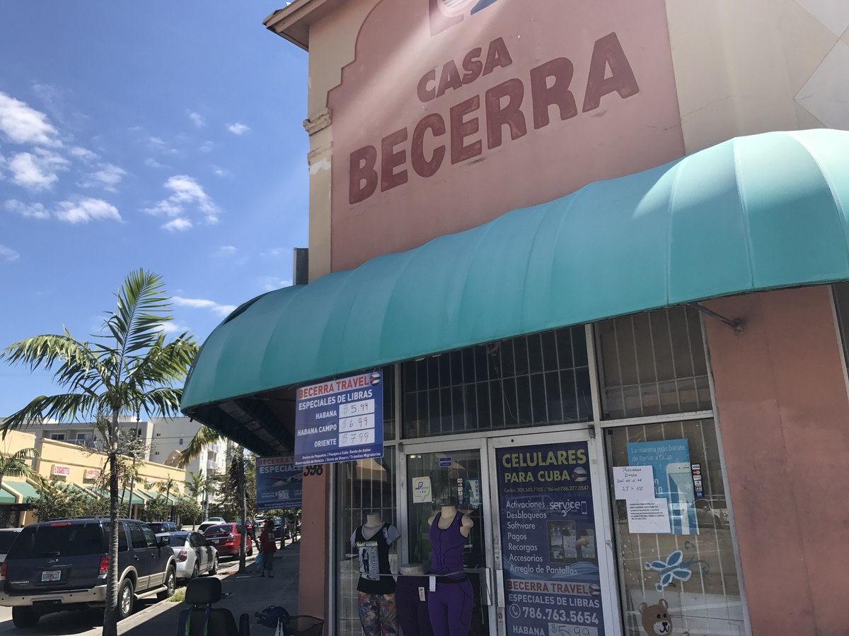 Turquoise storefront dome awnings